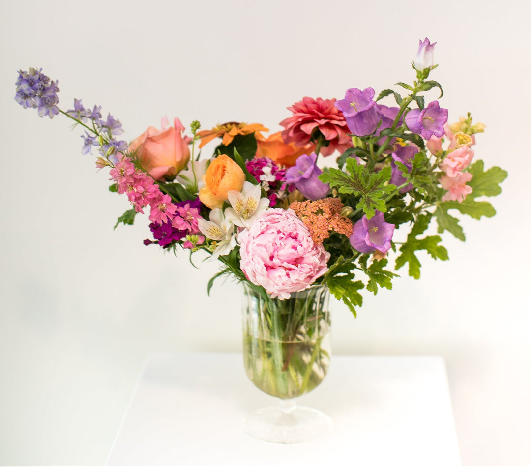 Colorful Arrangement of Flowers in a Clear Glass Vase in Kansas City