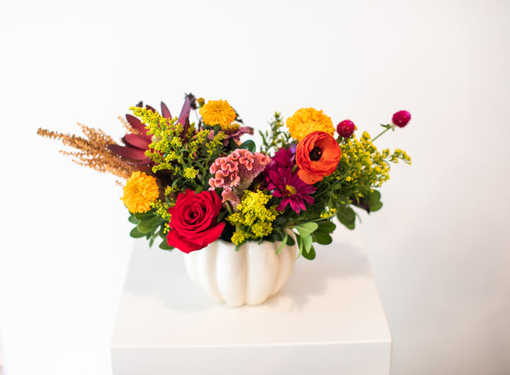 Colorful floral arrangement in a  white pumpkin-shaped vase Kansas City delivery Thanksgiving Fall flowers