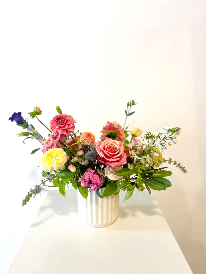 Spring florals in cream beam vase Lee's Summit Bel Fiore Co. flower shop