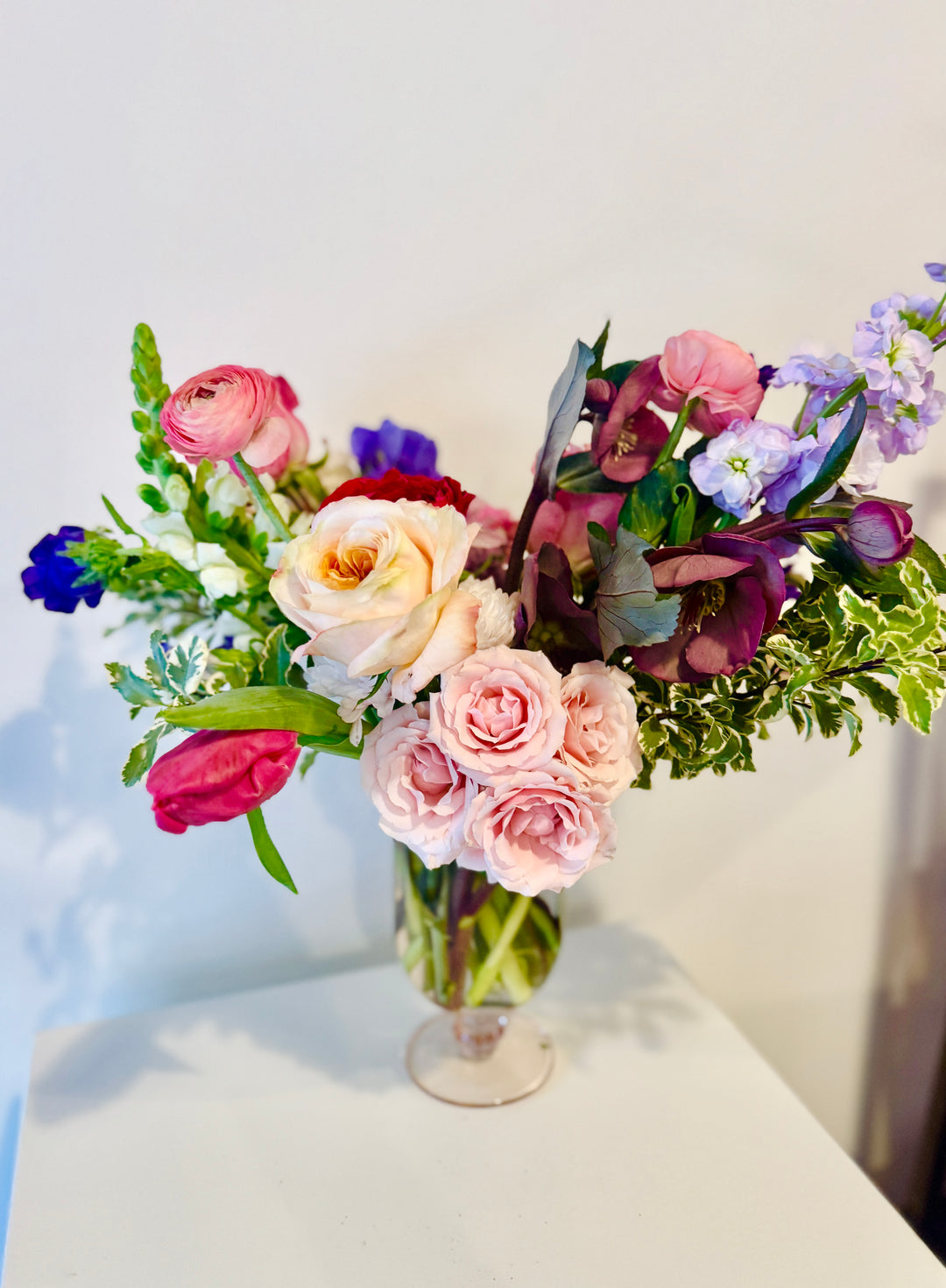Spring blooms in elegant glass vase Mother's Day Kansas City Lee's Summit flower shop
