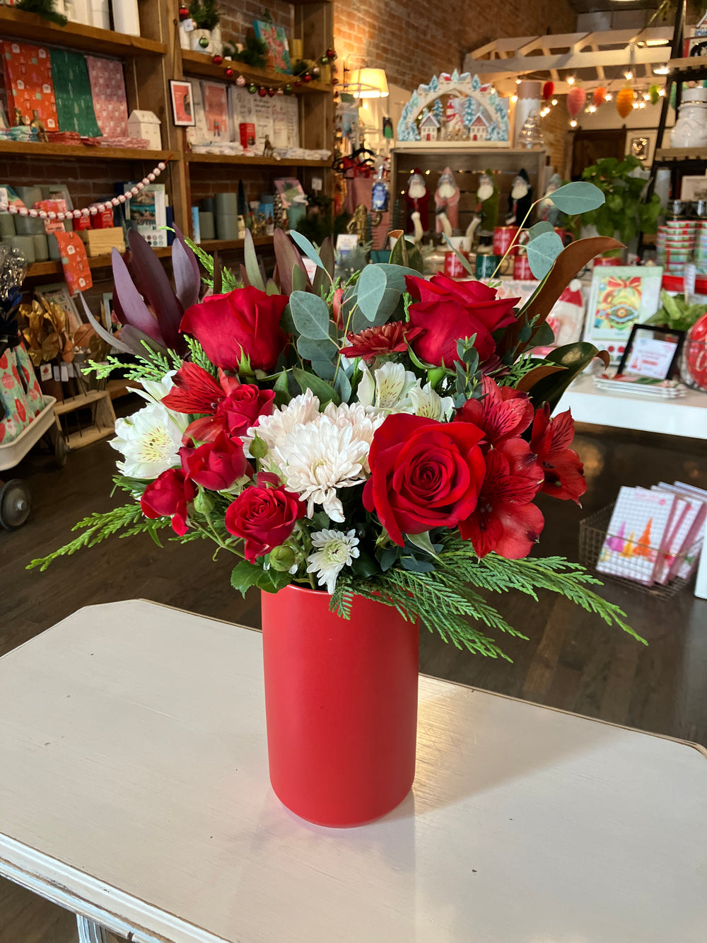 Traditional Christmas Arrangment, tall red vase Bel Fiore Co. Kansas City Lee's Summit Florist Delivery