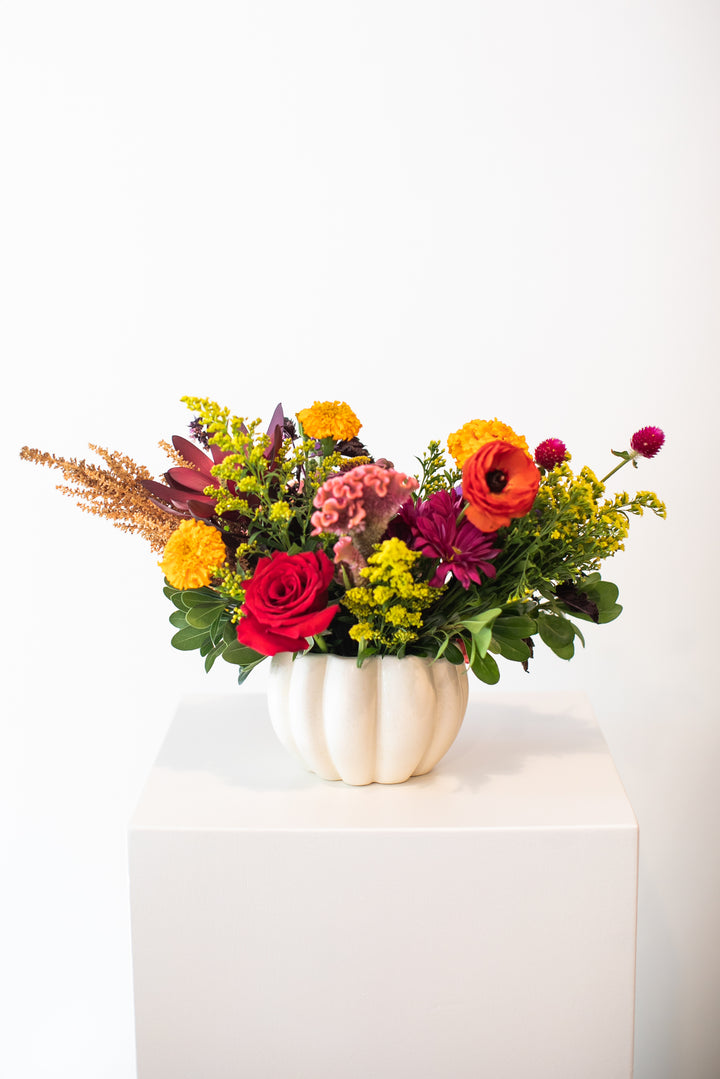 Colorful floral arrangement in a  white pumpkin-shaped vase Kansas City delivery Thanksgiving Fall flowers
