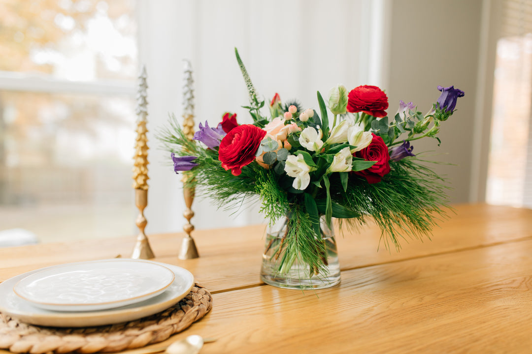 Grand Holiday Christmas arrangement roses and evergreens Kansas City Florist 
