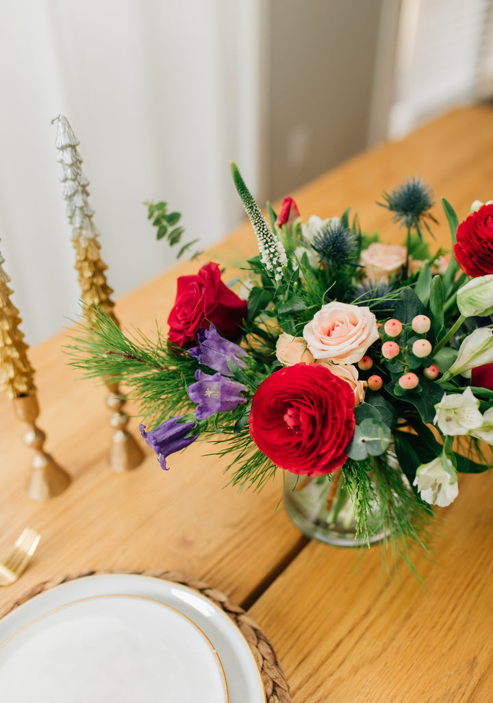 Grand Holiday Christmas arrangement roses and evergreens Kansas City Florist 